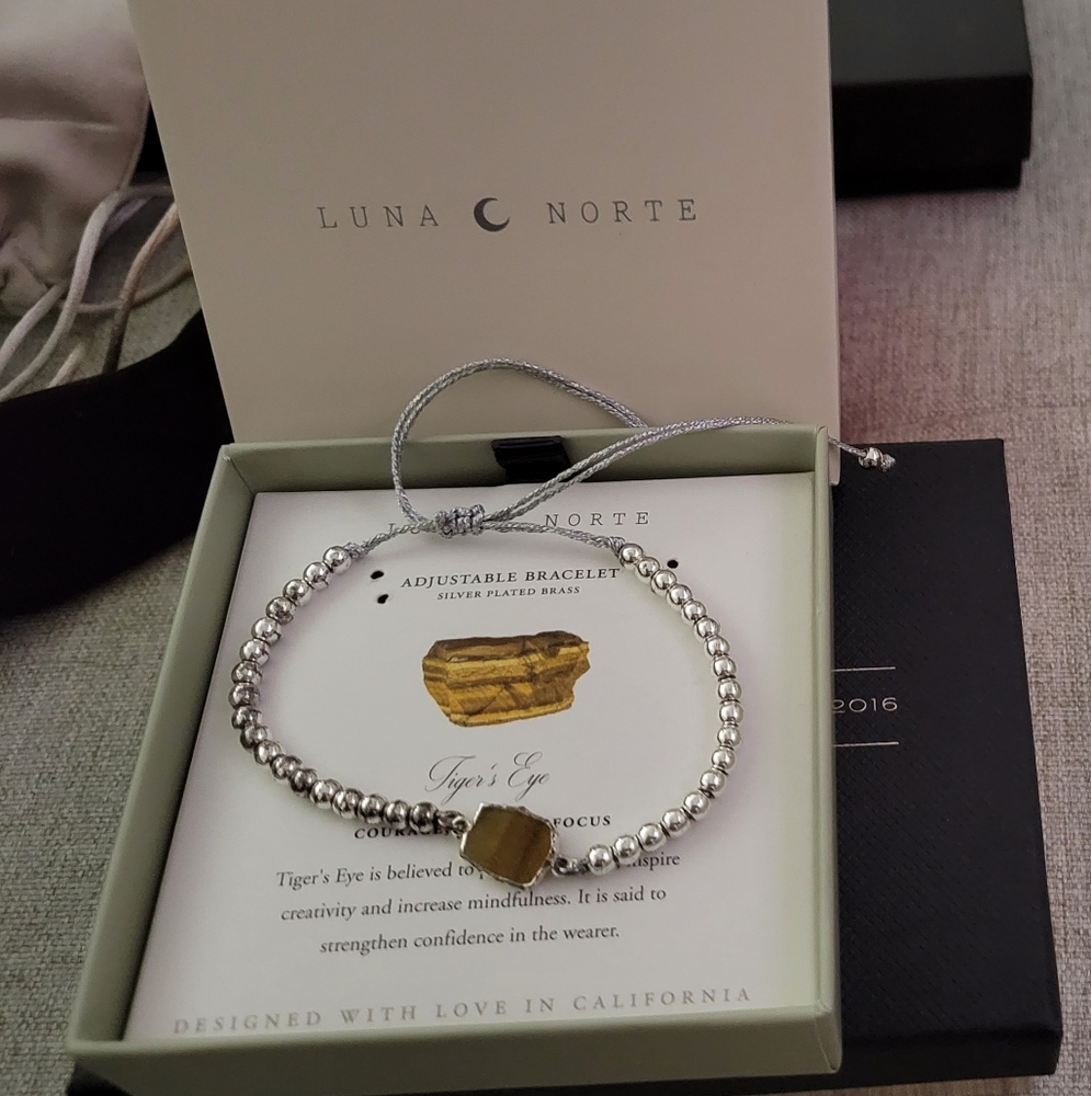 Silver pull string bracelet